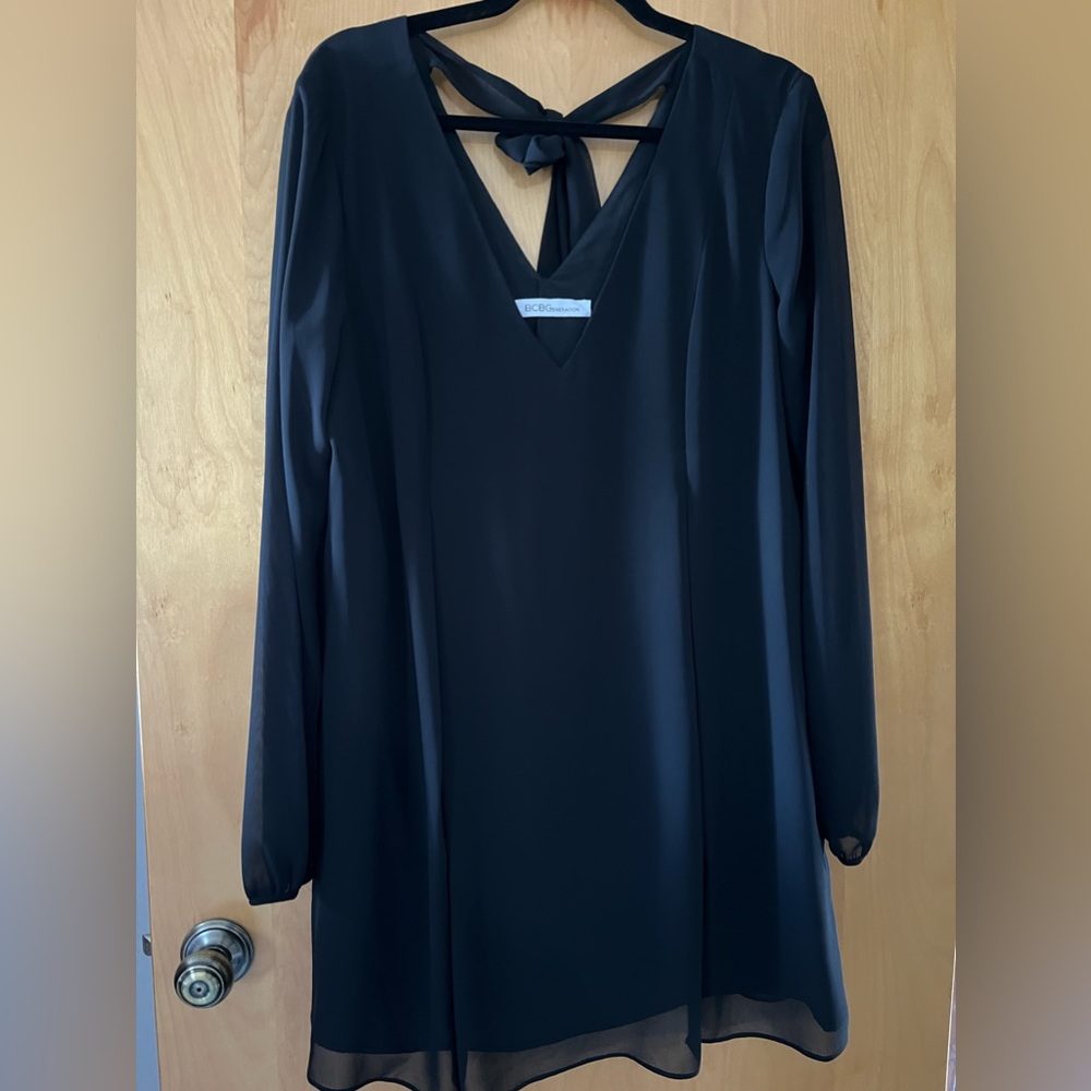 Women’s new w/out tags BCBG dress knee length tie back around neck upper